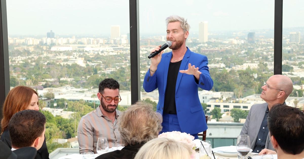 Lance Bass wears a blue suit and speaks during the EMA IMPACT Summit VIP Dinner at Pendry West Hollywood on June 3, 2024 in West Hollywood.