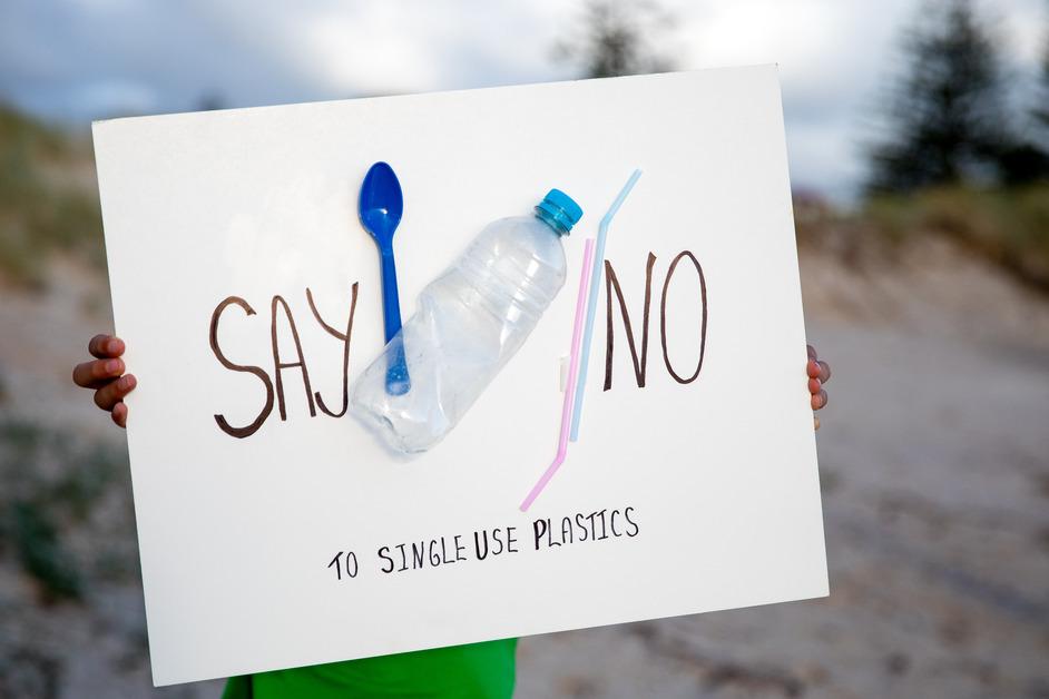 A stock photo of a sign saying "Say No to Single Use Plastics."